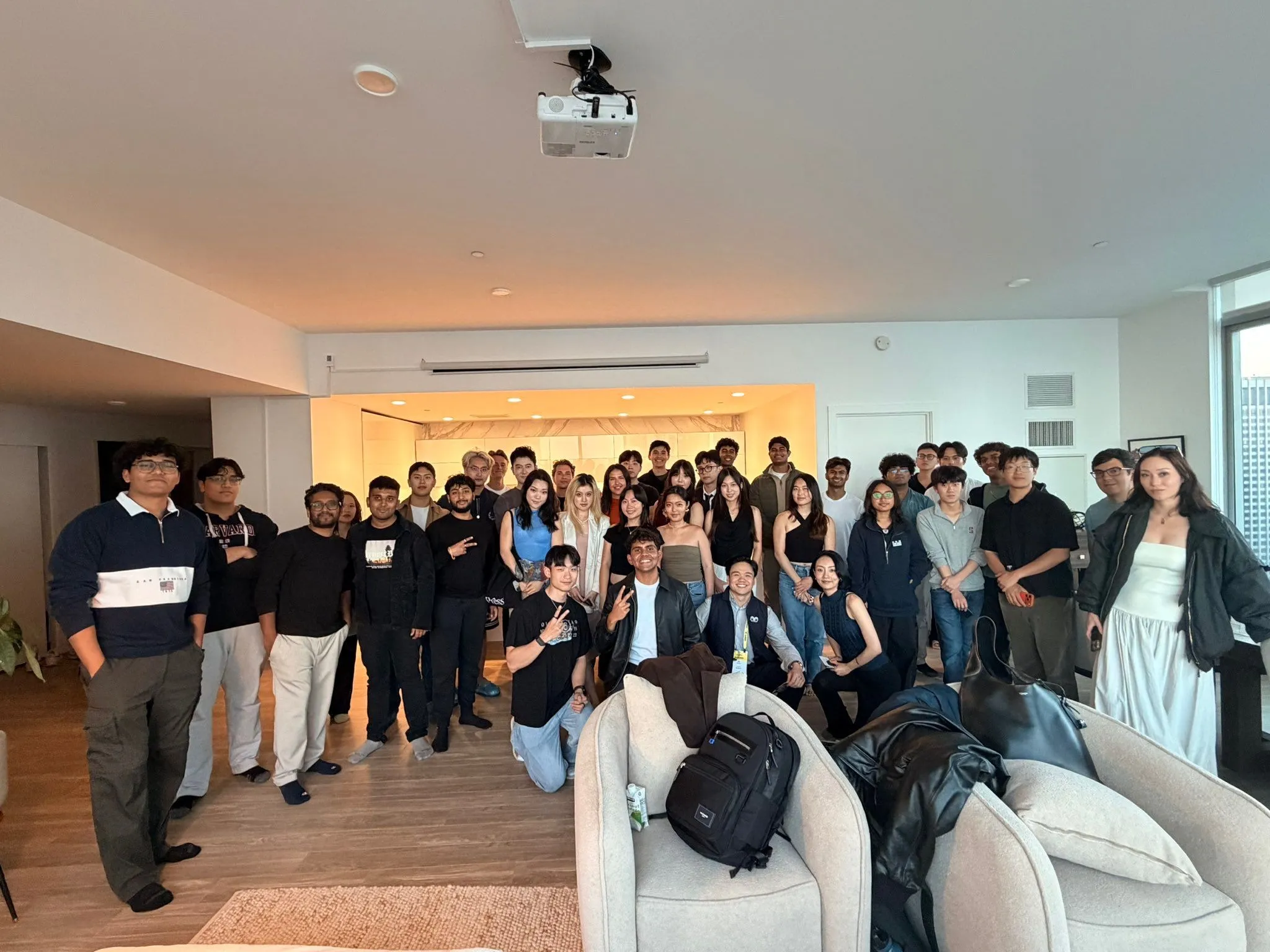 Dozens of Restart community members posing together at a meetup