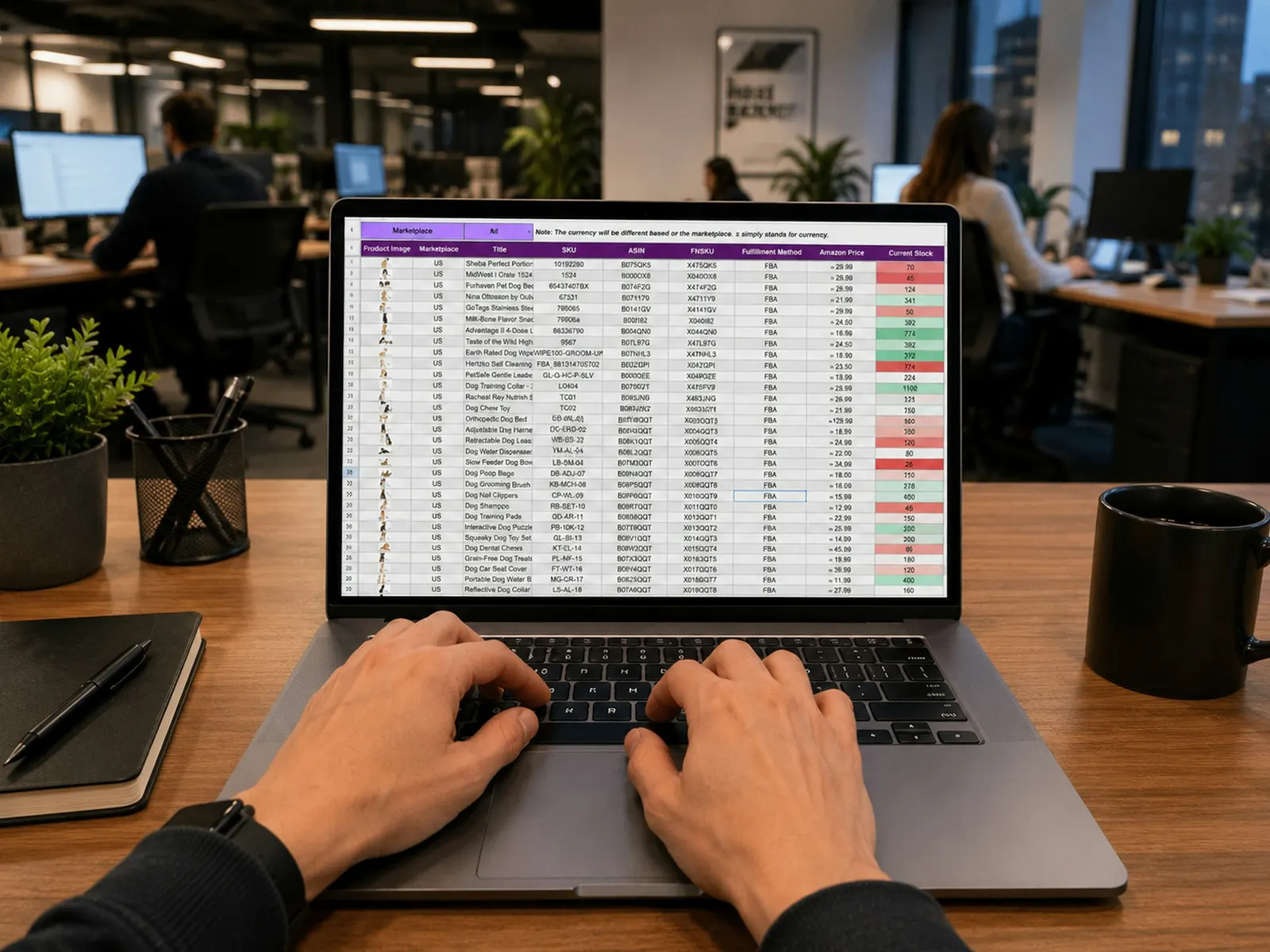 Hands typing on a laptop displaying a financial data spreadsheet