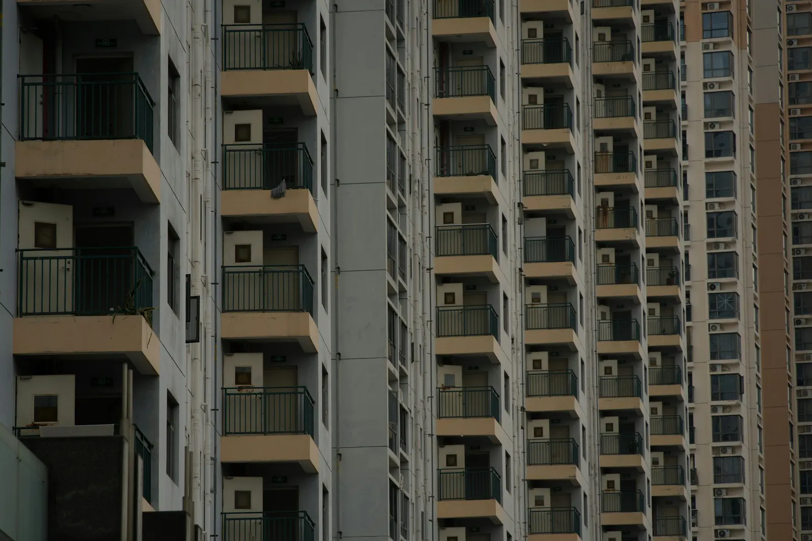 Rows of balconies on a modern multi-storey apartment building